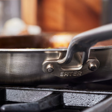 Heritage Steel Eater 12" Stainless Steel Frying Pan Handle view with logo