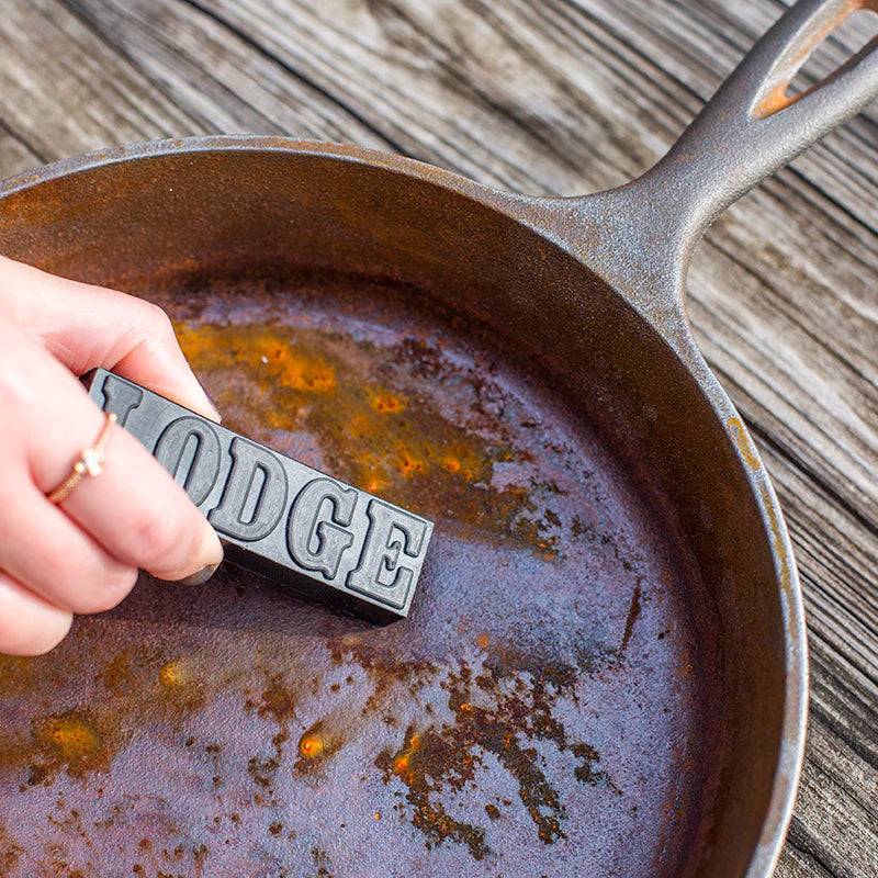 Lodge Rust Eraser with cast iron pan