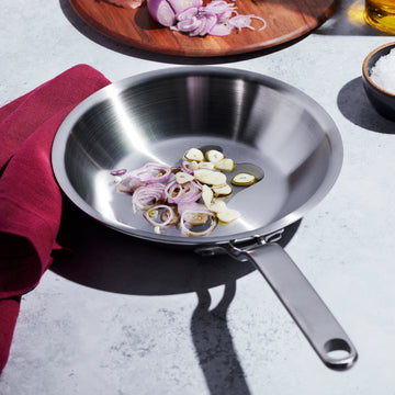 Heritage Steel Eater 8.5” Stainless Steel Fry Pan with Onions and Garlic